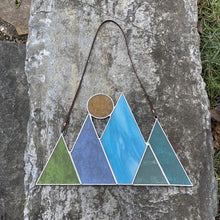 Stained glass mountain and moon home decor. Handmade stained glass art created by artist Carrie Root of the Root Studio in Addison Vermont.