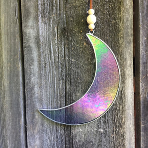 Crescent moon stained glass sun catcher. Handmade in Vermont by artist Carrie  Root of the Root Studio.