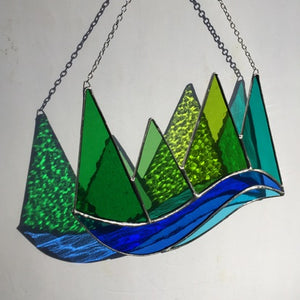 green mountains and lake stained glass handmade by artist carrie root of the root studio in addison, vermont