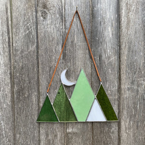 Stained glass mountain and moon home decor sun catcher handmade in vermont by carrie root of the root studio.