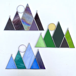 mountains and sun or moon stained glass home decor.  handmade in vermont by artist carrie root of the root studio.  green mountain art inspired by vermont